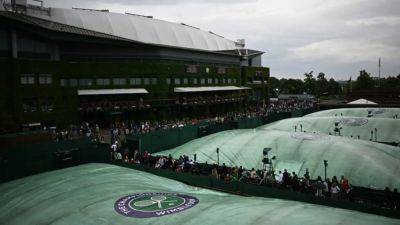 Player safety key, organisers say, after Centre Court roof delay