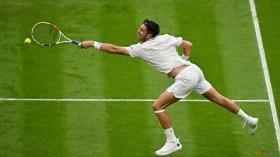 King Federer back in town as Alcaraz and Rybakina shine at Wimbledon