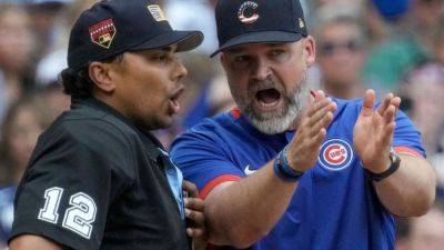 Cubs' Ross rips umpire, decision to close roof in Milwaukee - ESPN
