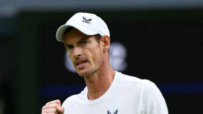 Andy Murray - Ryan Peniston - Mighty Murray lifts Wimbledon gloom - channelnewsasia.com - Britain - Scotland - county Centre