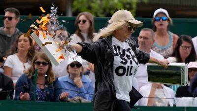 Environmental activists, rain put pause to play at Wimbledon for 2nd straight day