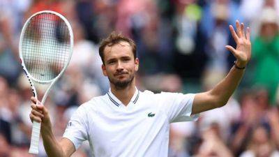 Medvedev, Swiatek cruise as climate protesters disrupt Wimbledon
