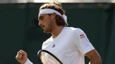 Tsitsipas needs two days to beat Thiem in five sets