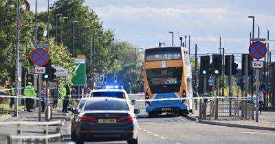 Female cyclist hit by bus as windscreen left shattered and police close main road - manchestereveningnews.co.uk