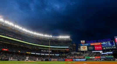 Cameraman stretchered off field after errant throw hits him in head at Yankees game