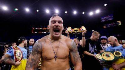 Usyk to defend heavyweight titles against Dubois