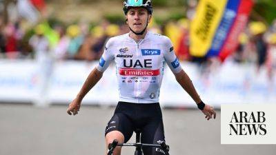 Pogacar wins Tour de France summit duel with Vingegaard