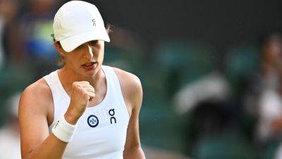 Wimbledon 2023: Top seed Iga Swiatek reaches last 16 without dropping a set after taking down Petra Martic