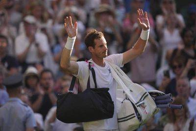 Wimbledon: Murray casts doubt on future as Djokovic races past Wawrinka