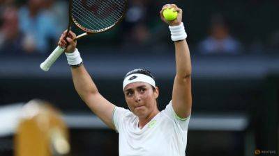 Jabeur battles back to beat Andreescu