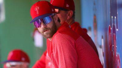Phillies' Bryce Harper hit on surgically repaired elbow, leaves game - ESPN