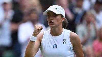 Top seed Swiatek fights back from the brink to beat Bencic