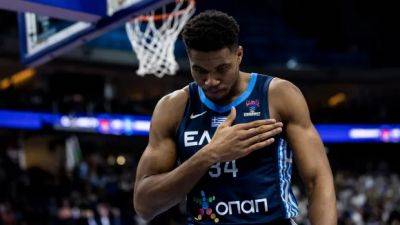 Luka Doncic - Star - Greece's Giannis Antetokounmpo out of World Cup amid surgery recovery - cbc.ca - Canada - Japan - county Bucks - Indonesia - New Zealand - Slovenia - Jordan - Philippines - Greece - county Alexander