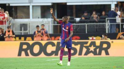 France forward Dembele leaves Barcelona to join PSG