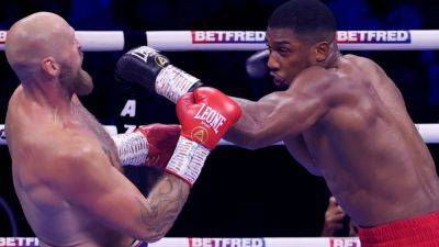 Joshua KOs stand-in Helenius but boo boys make noise