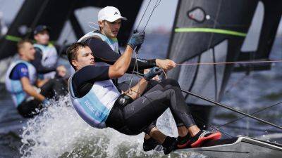 Rob Dickson and Sean Waddilove into Gold fleet final at World Championship