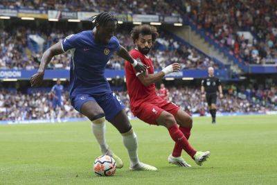 Pochettino's Chelsea fight back to draw with Liverpool in Premier League opener