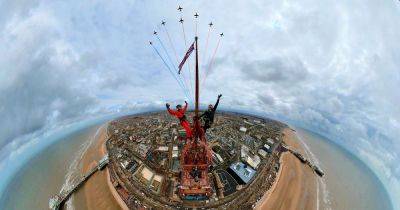 The amazing moment Red Arrows fly over daredevils on Blackpool Tower