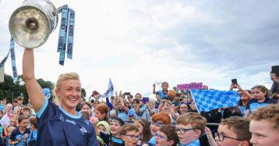 Dublin Ladies team celebrate All-Ireland football victory with fans