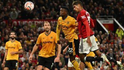 Wolves rue penalty decision as Ten Hag hails United's fighting spirit