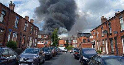 BREAKING: Scores of fire crews descend on primary school as roof goes up in flames - latest updates - manchestereveningnews.co.uk - county Walker