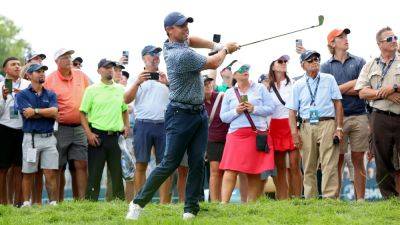 McIlroy grabs share of early clubhouse lead at the BMW