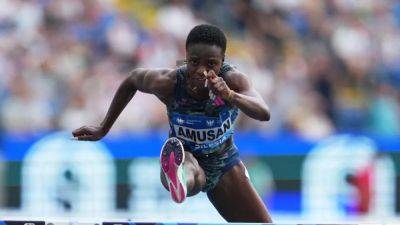 Tobi Amusan - World hurdles champion Amusan's doping suspension lifted - channelnewsasia.com - state Oregon - Nigeria