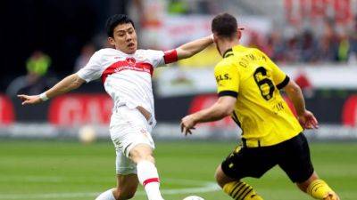 Liverpool sign Japan midfielder Endo from Stuttgart