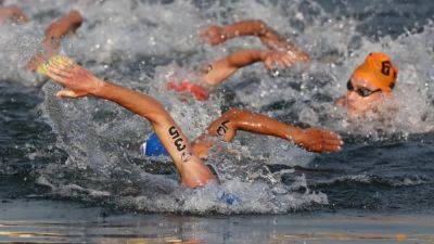 Triathlon-Para swim leg at Paris test event dropped over Seine water quality