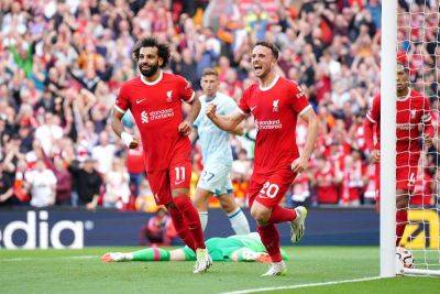 Liverpool survive red card scare to crush Cherries at Anfield