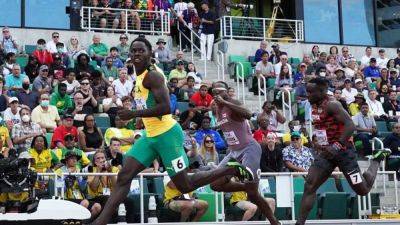 Jamaica's Seville steals US thunder in 100m heats