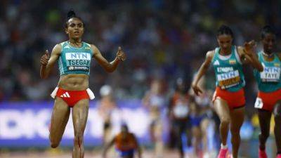 Ethiopia's Tsegay wins 10,000 metres after Hassan stumbles to the ground