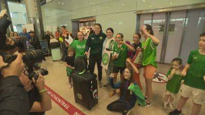 Republic of Ireland squad greeted by fans at Dublin Airport