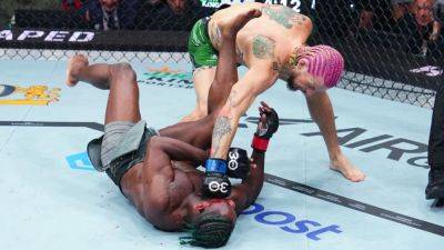 UFC 292: Sean O'Malley dethrones Aljamain Sterling, Zhang Weili dominates in title defense - ESPN - espn.com
