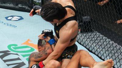 Joanna Jedrzejczyk - Zhang Weili overpowers Amanda Lemos in UFC 292 co-main event - ESPN - espn.com - Brazil - China