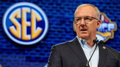 CFP must be reconsidered amid realignment, SEC commish says - ESPN