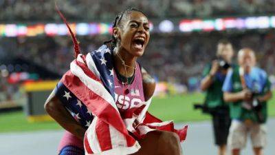 Sha'Carri Richardson captures 1st world title with victory in stacked 100M race