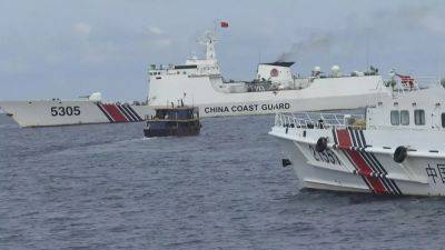 Chinese ships block Philippine coast guard in latest South China Sea standoff