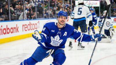 Maple Leafs, Auston Matthews reach 4-year, $53M extension - ESPN