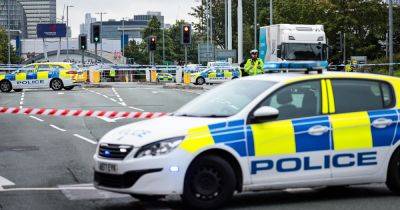 Man, 37, fighting for life after crash with lorry shuts main road
