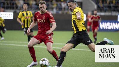 Ajax cruise and Aberdeen battle back in Europa League
