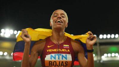 Rojas claims fourth straight world triple jump title with last attempt