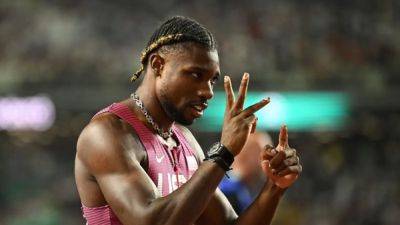 Noah Lyles - Andre De-Grasse - Lyles completes sprint double with third straight world 200m title - channelnewsasia.com - Usa - Canada - Botswana - Jamaica