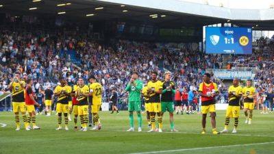 Dortmund's Malen to the rescue again in 1-1 draw at Bochum