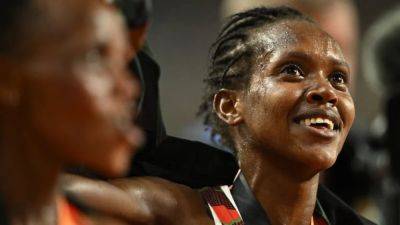 Faith Kipyegon - Kenya's Kipyegon claims 5,000m win for second gold in Budapest - channelnewsasia.com - Netherlands - Kenya