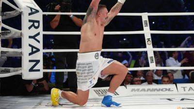 Usyk knocks out Dubois in nine after low blow controversy