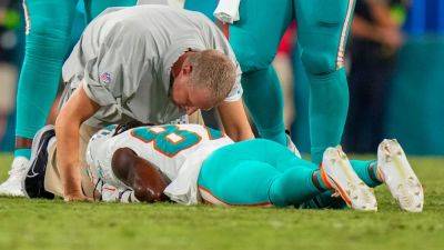 Mike Macdaniel - Trevor Lawrence - Doug Pederson - Dolphins' Davis 'has movement in all extremities' after injury - ESPN - espn.com