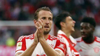 Kane scores twice on league home debut as Bayern beat Augsburg 3-1