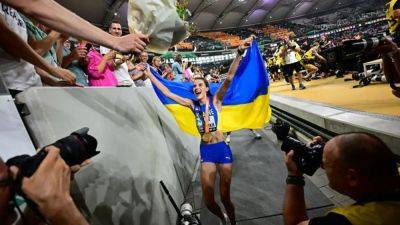 Ukraine's Mahuchikh soars to world championship victory in women's high jump