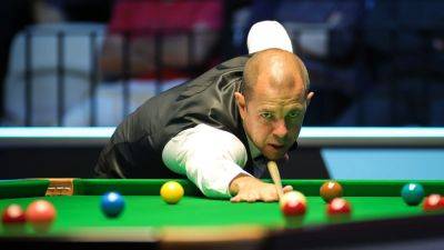 Barry Hawkins sees off Judd Trump to triumph in European Masters